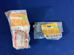 New Kawasaki Miscellaneous Parts, Damper 92075-1784, Front Bracket 11043-1423*. Fixed Price $20.00.
